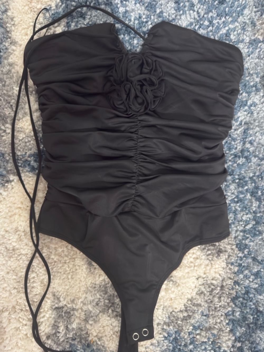 Black Ruched One-Piece with Floral Detail